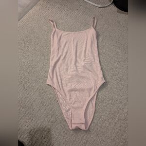 NWT Baby pink body suit